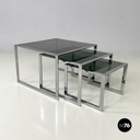 Italian modern Trio of coffee tables in smoked glass and metal, 1980s