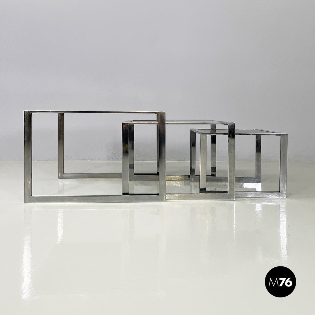 Italian modern Trio of coffee tables in smoked glass and metal, 1980s