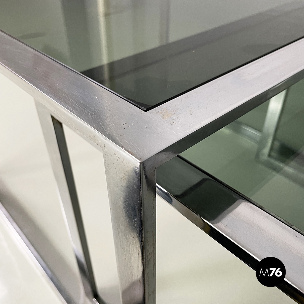 Italian modern Trio of coffee tables in smoked glass and metal, 1980s