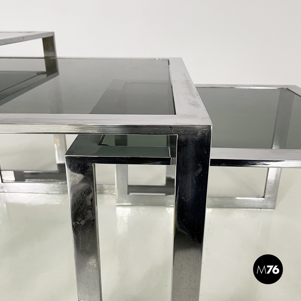 Italian modern Trio of coffee tables in smoked glass and metal, 1980s