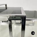 Italian modern Trio of coffee tables in smoked glass and metal, 1980s