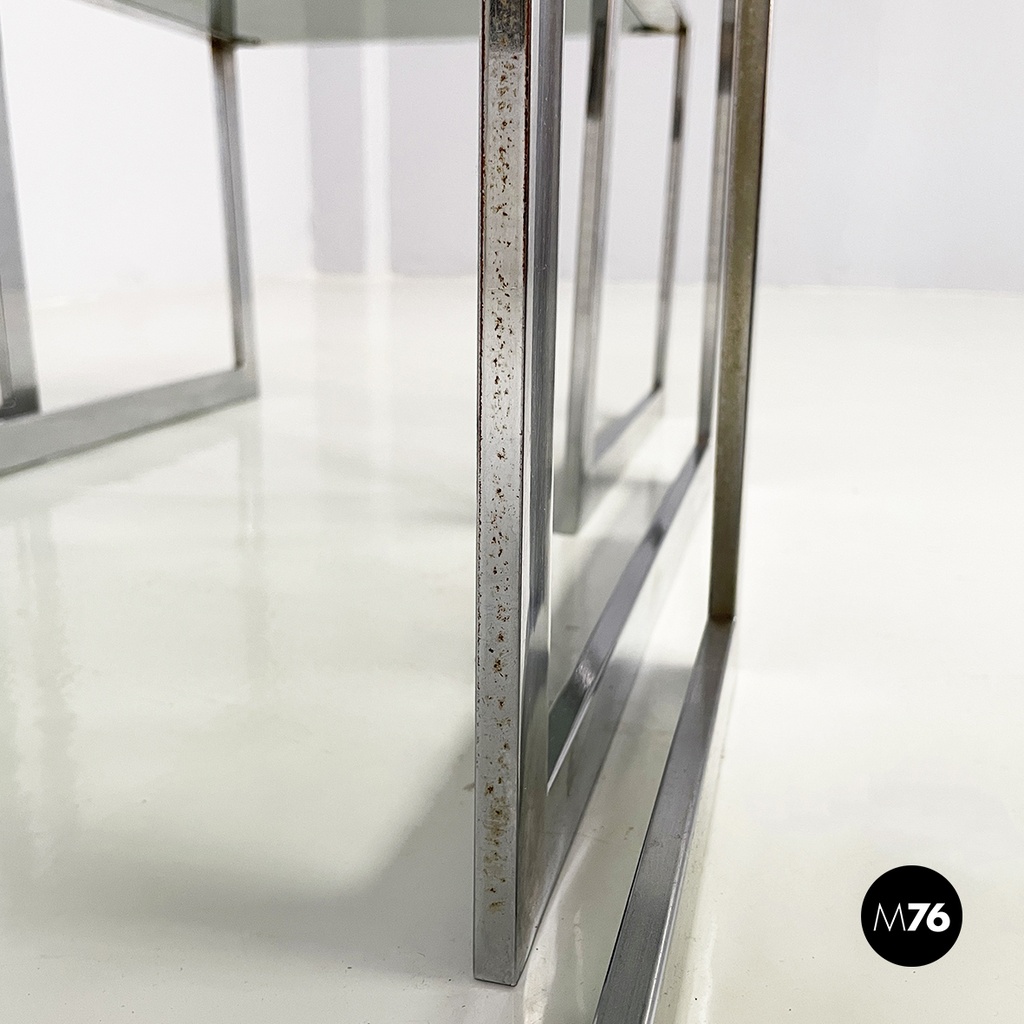 Italian modern Trio of coffee tables in smoked glass and metal, 1980s