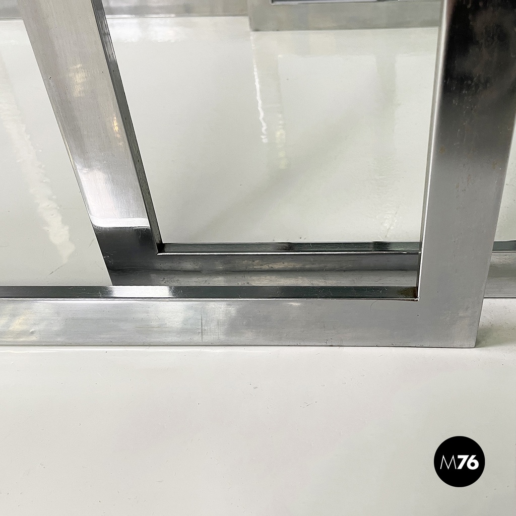 Italian modern Trio of coffee tables in smoked glass and metal, 1980s