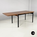 Italian mid-century modern Extendable dining table in wood and black metal 1960s