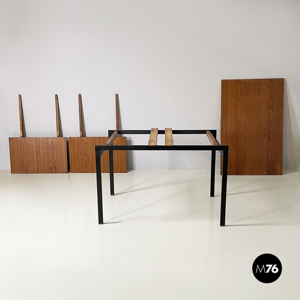 Italian mid-century modern Extendable dining table in wood and black metal 1960s