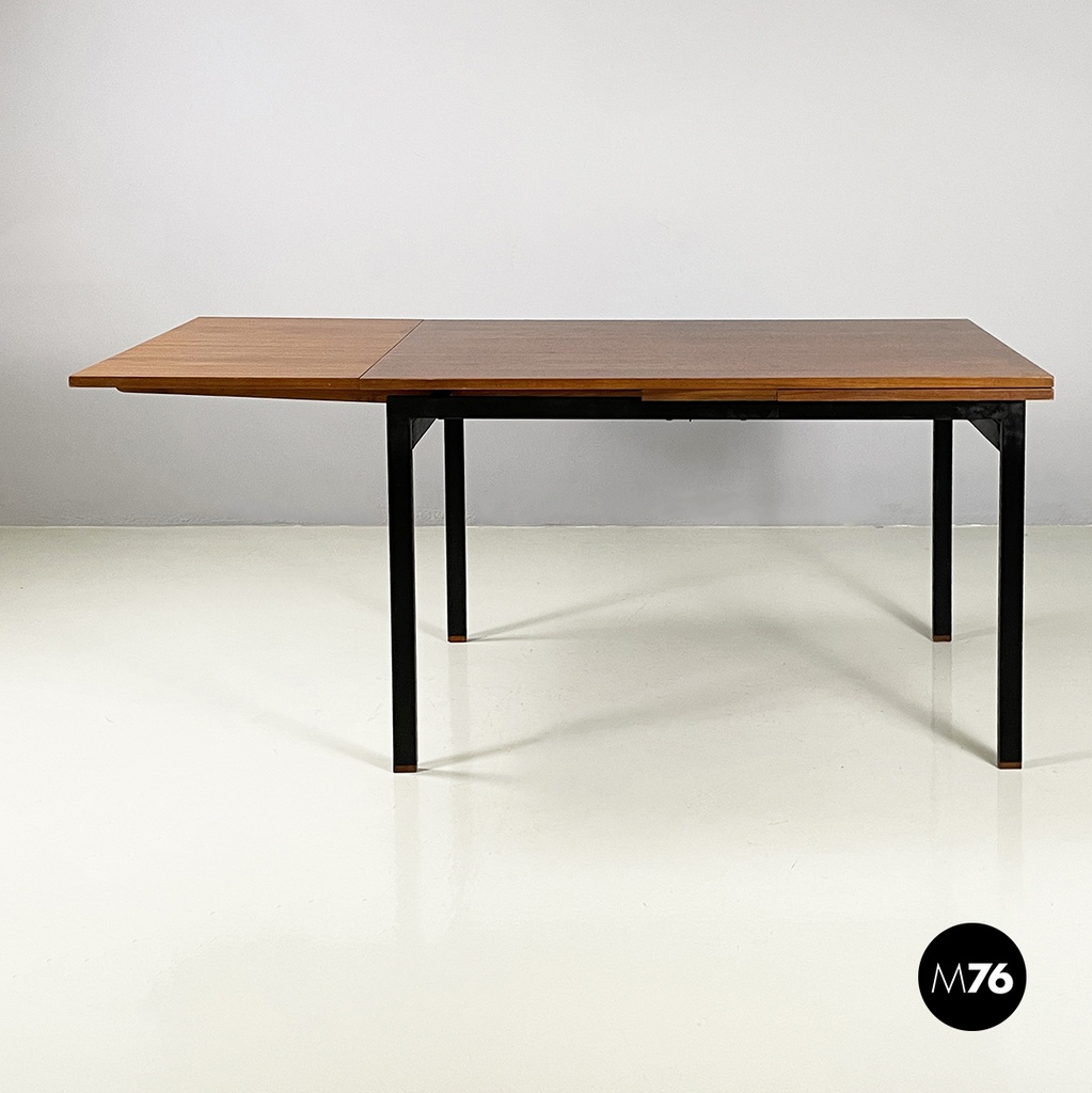 Italian mid-century modern Extendable dining table in wood and black metal 1960s