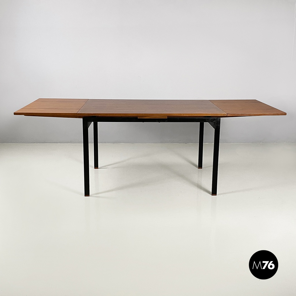 Italian mid-century modern Extendable dining table in wood and black metal 1960s