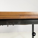 Italian mid-century modern Extendable dining table in wood and black metal 1960s