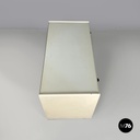 Italian post-modern white wood chest of drawers with black plastic handles 1980s