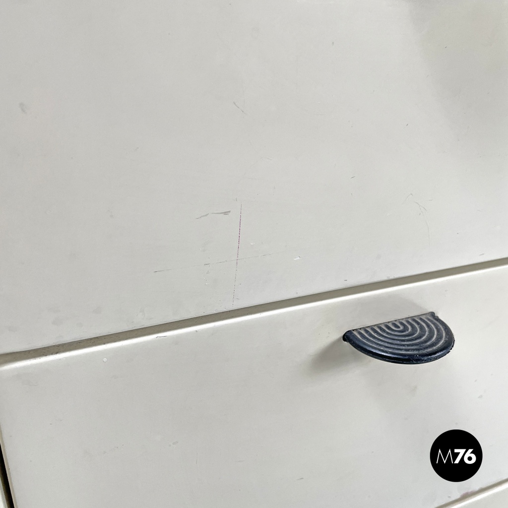 Italian post-modern white wood chest of drawers with black plastic handles 1980s
