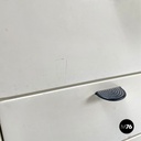 Italian post-modern white wood chest of drawers with black plastic handles 1980s