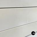 Italian post-modern white wood chest of drawers with black plastic handles 1980s