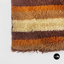 Space Age Italian short pile brown carpet, with orange and beige decoration 1970