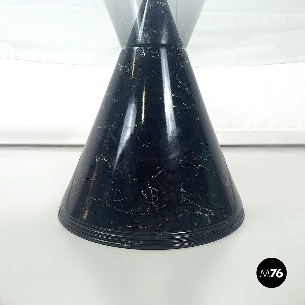 Italian modern round coffe table in glass with black marble conical base, 1980s