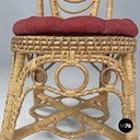 Italian antique rattan chairs with round decorations and red pillows early 1900s