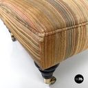 Italian modern pouf on brass wheels with orange and brown striped fabric, 1970s