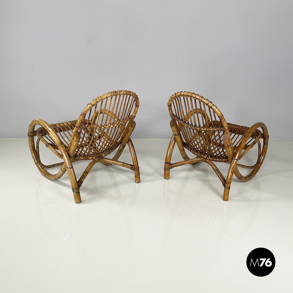 Italian mid-century modern Armchairs with armrests in curved rattan, 1960s