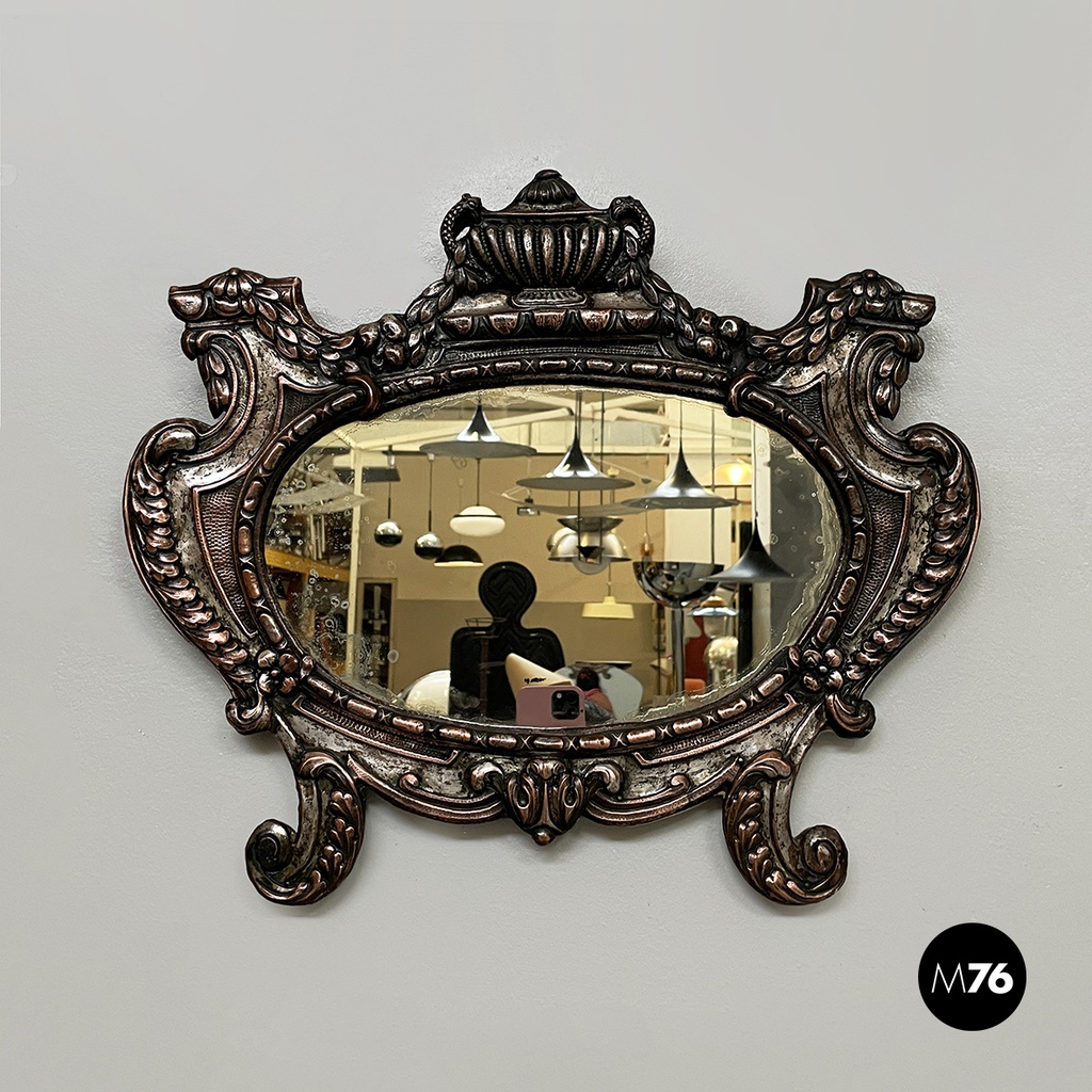 Italian finely crafted oval wall mirror in silvered copper, early 1900s