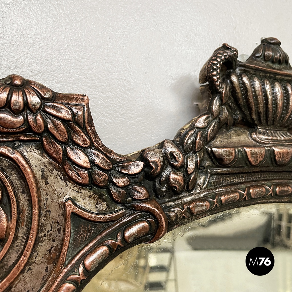Italian finely crafted oval wall mirror in silvered copper, early 1900s