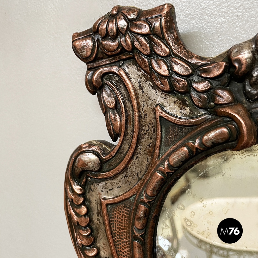 Italian finely crafted oval wall mirror in silvered copper, early 1900s