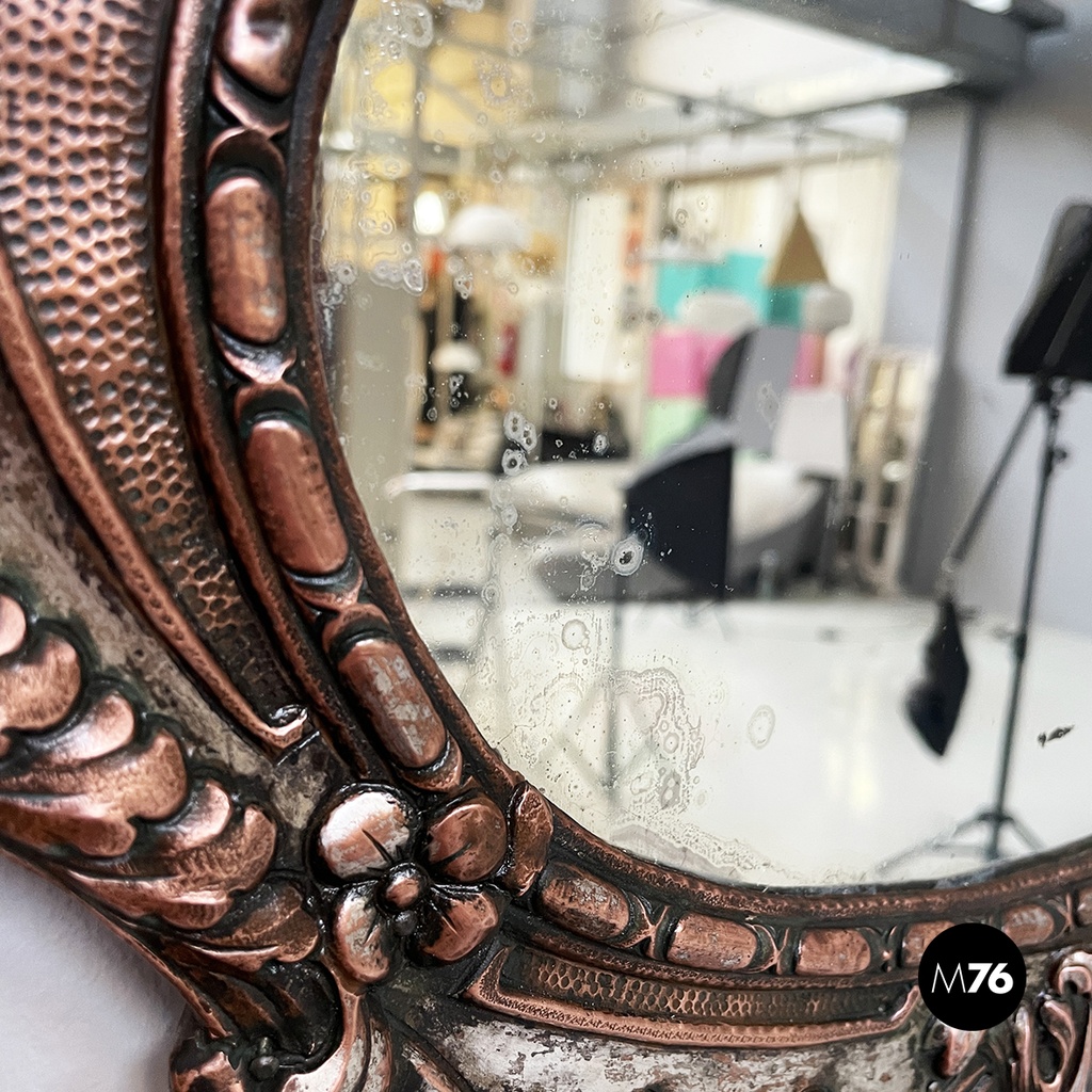 Italian finely crafted oval wall mirror in silvered copper, early 1900s