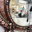 Italian finely crafted oval wall mirror in silvered copper, early 1900s