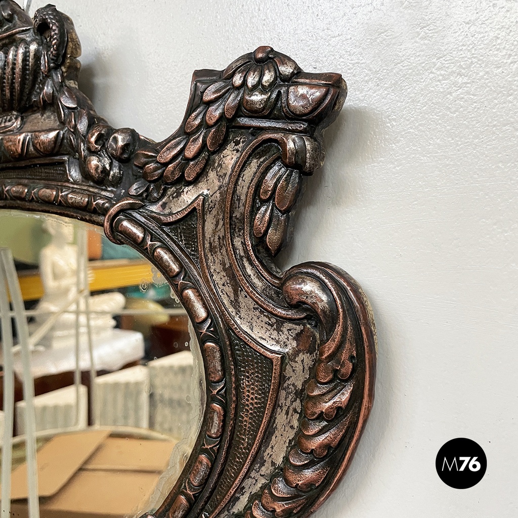 Italian finely crafted oval wall mirror in silvered copper, early 1900s
