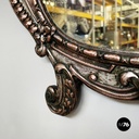 Italian finely crafted oval wall mirror in silvered copper, early 1900s