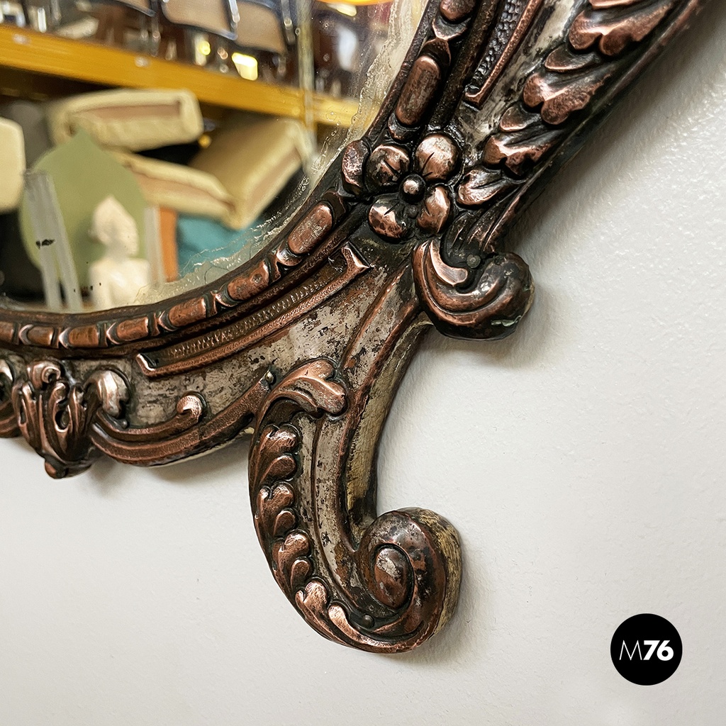 Italian finely crafted oval wall mirror in silvered copper, early 1900s