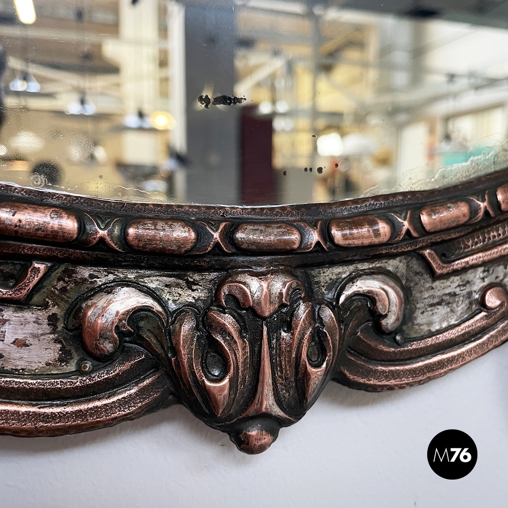 Italian finely crafted oval wall mirror in silvered copper, early 1900s