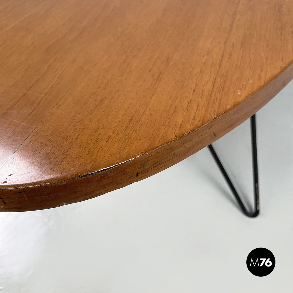 Italian mid-century modern Oval coffee table in wood and black metal, 1960s
