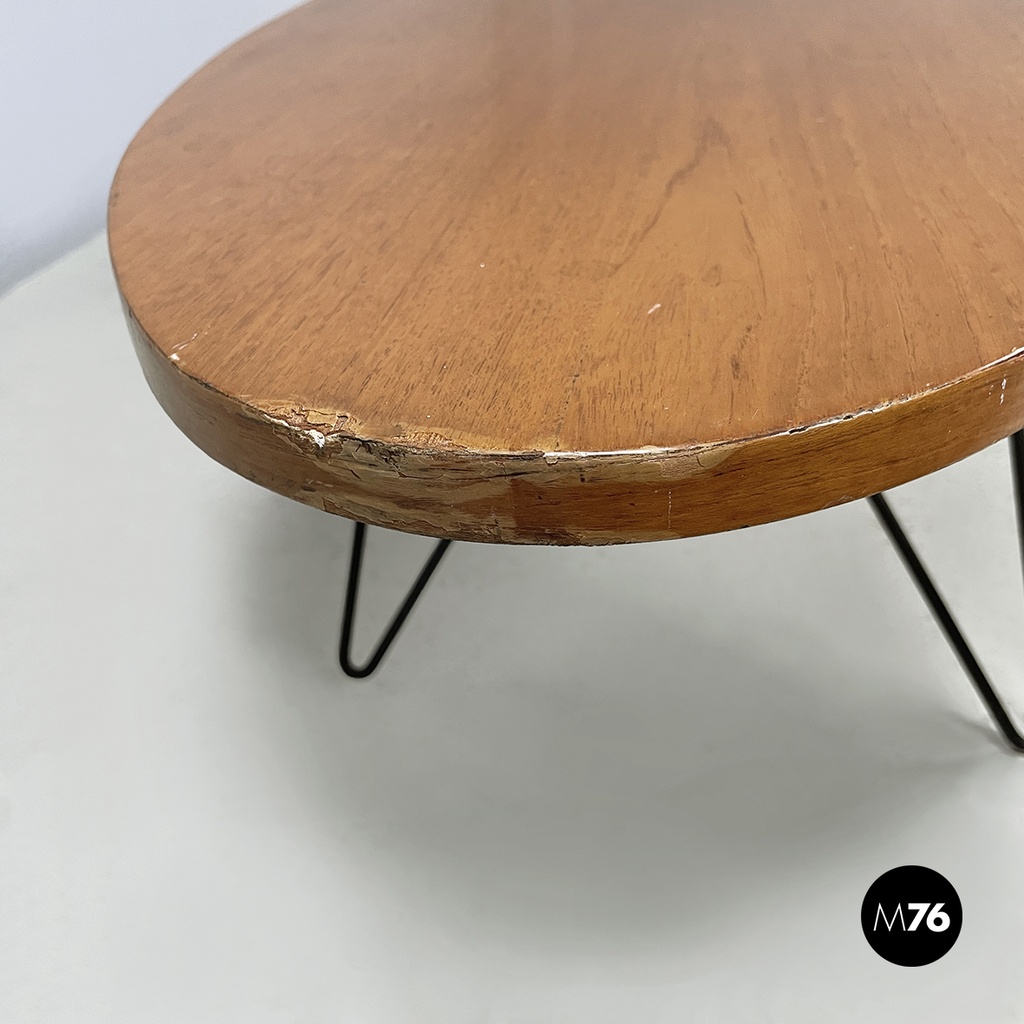 Italian mid-century modern Oval coffee table in wood and black metal, 1960s