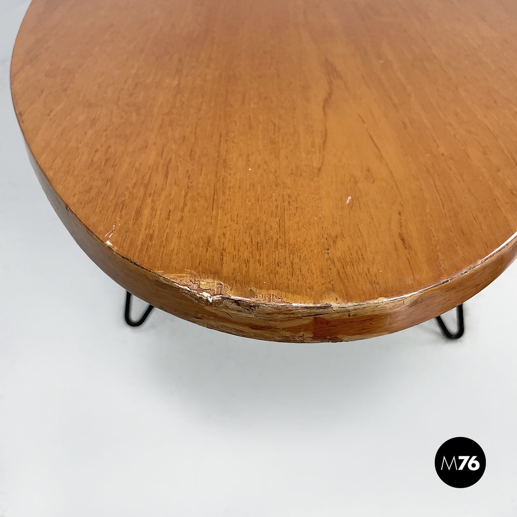 Italian mid-century modern Oval coffee table in wood and black metal, 1960s