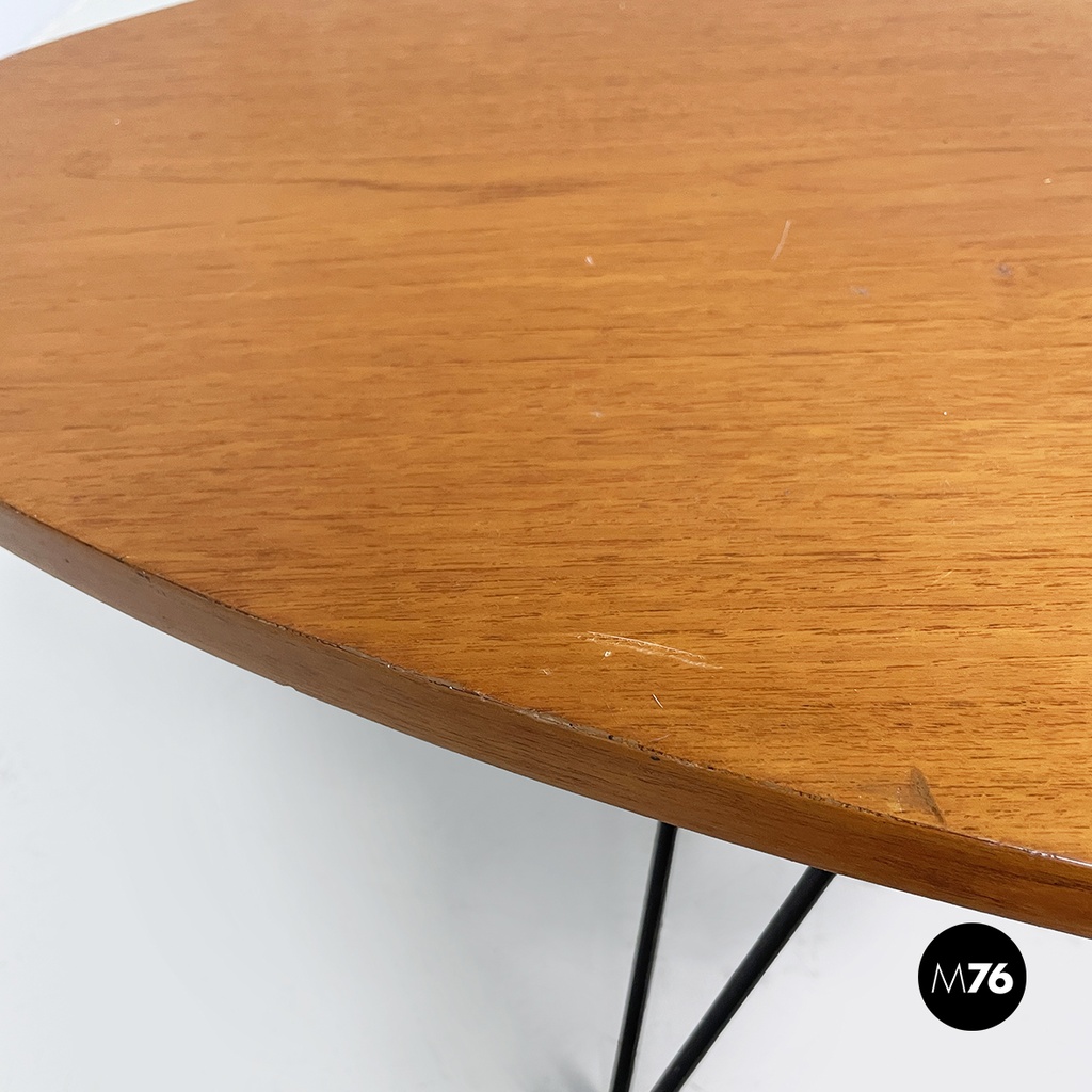 Italian mid-century modern Oval coffee table in wood and black metal, 1960s