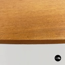 Italian mid-century modern Oval coffee table in wood and black metal, 1960s