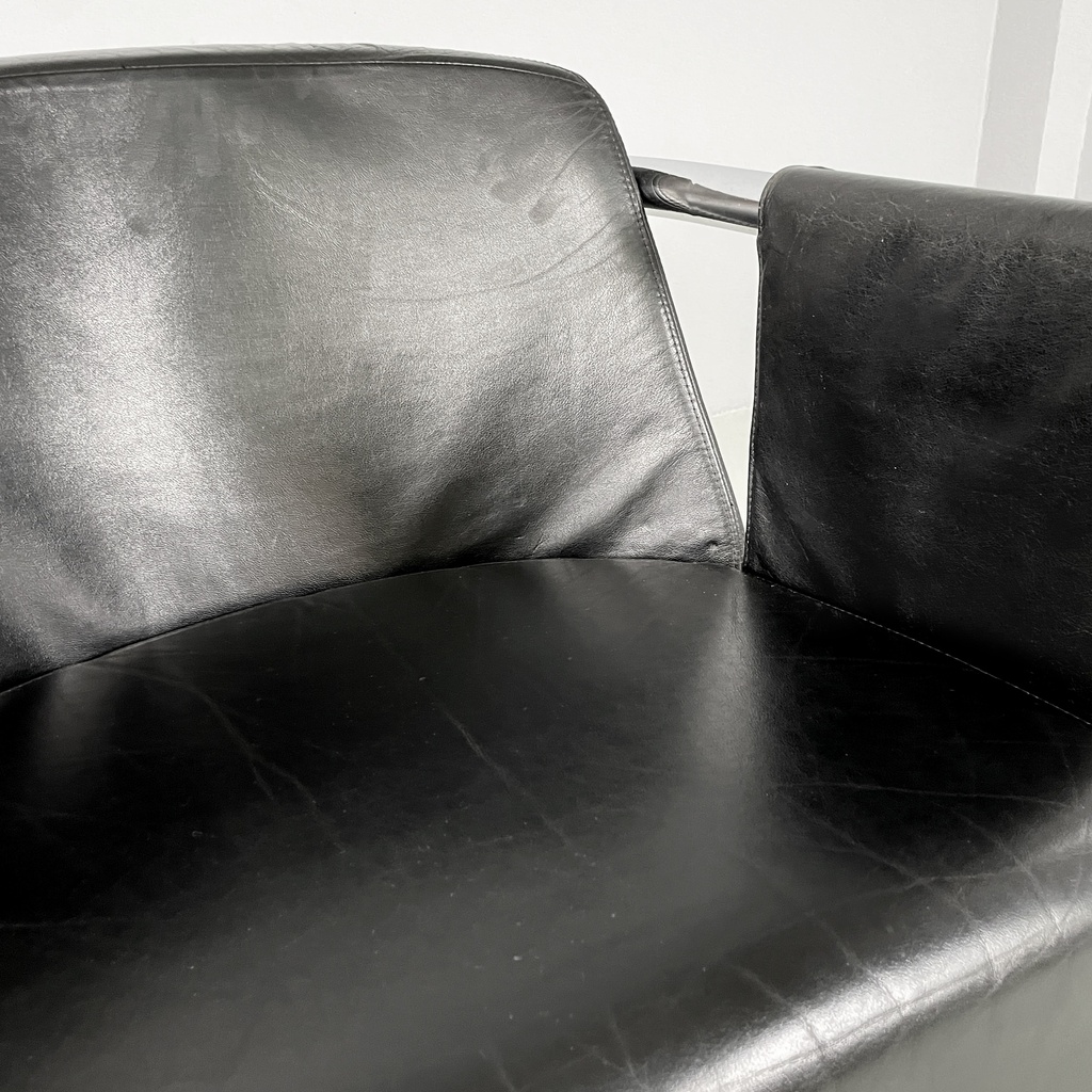Poltrona in pelle nera e acciaio, 1980 ca.