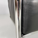 Poltrona in pelle nera e acciaio, 1980 ca.