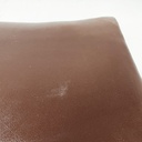 Pouf in pelle marrone e legno, 1960 ca.