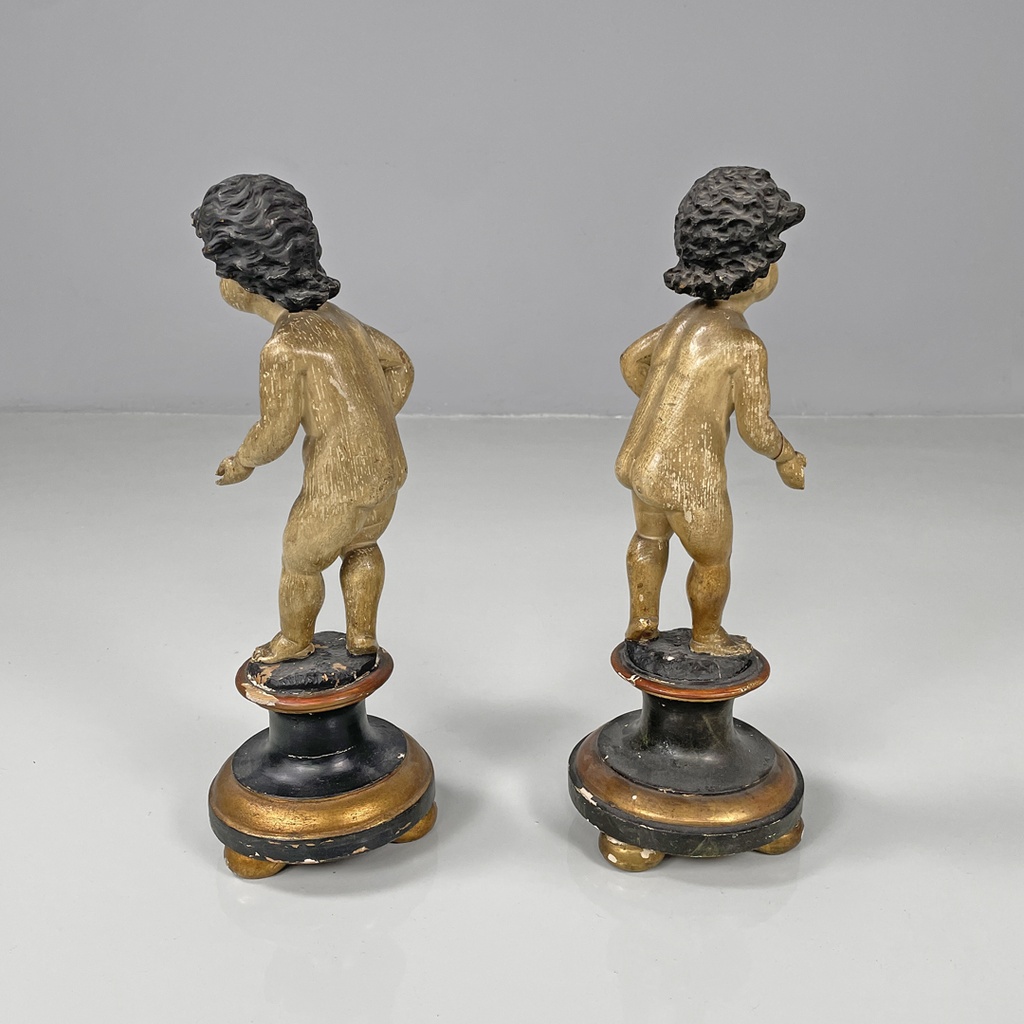Sculture di putti in legno, fine 1800 ca.