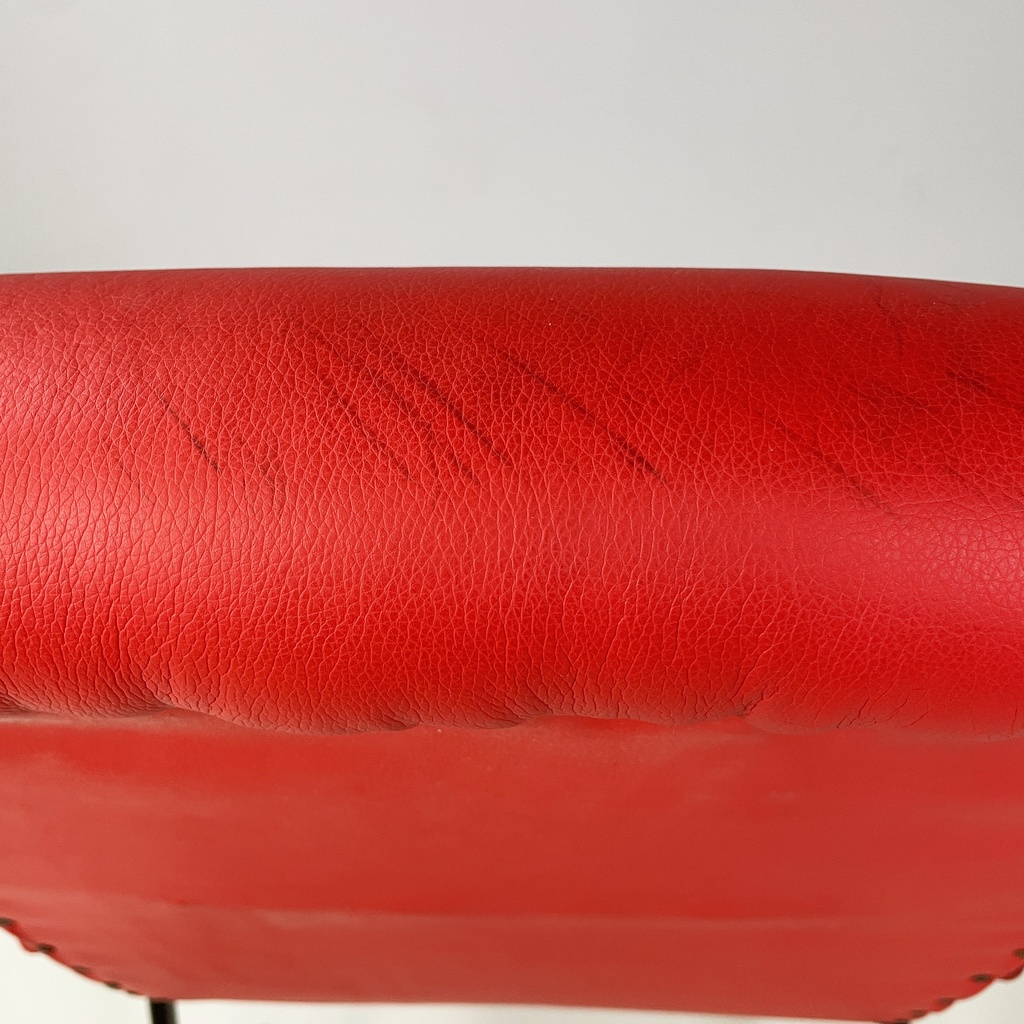 Poltrona in sky rosso e metallo nero, 1960 ca.