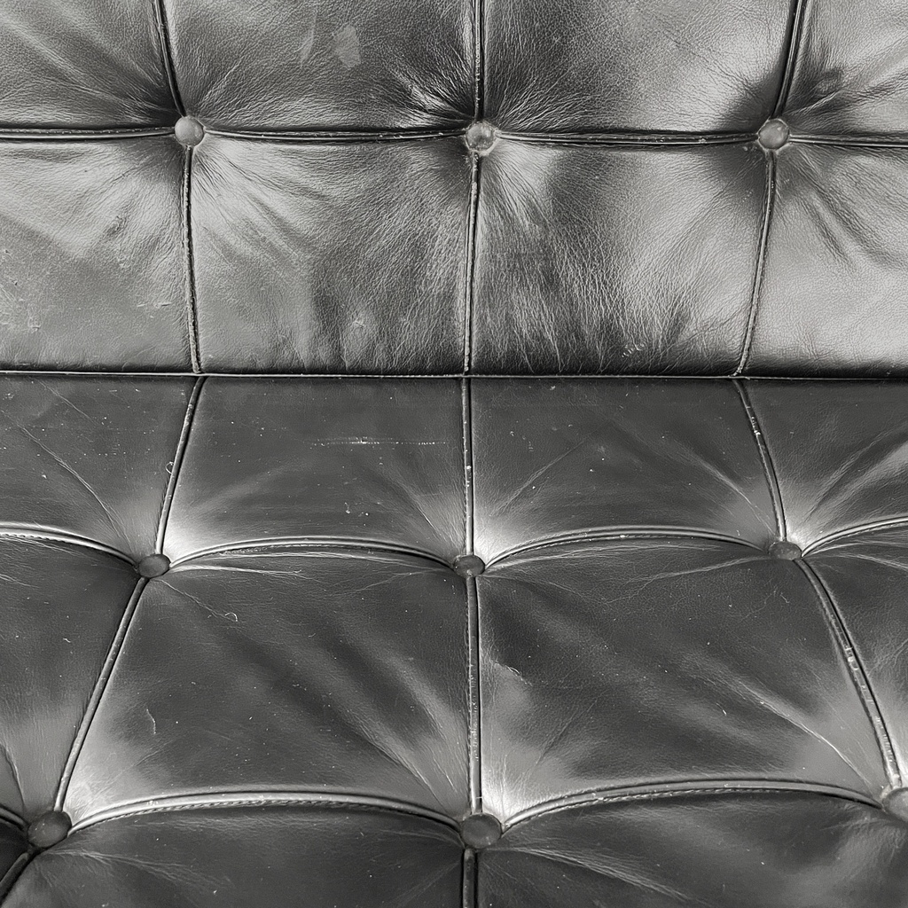 Poltrone in pelle nera e acciaio, 1970 ca.