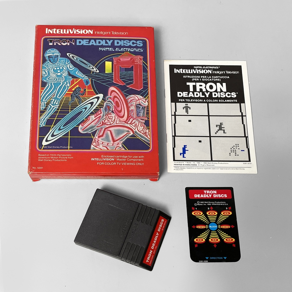 Consolle Intellivision e videogioco di Tron deadly discs di Mattel, 1980 ca.