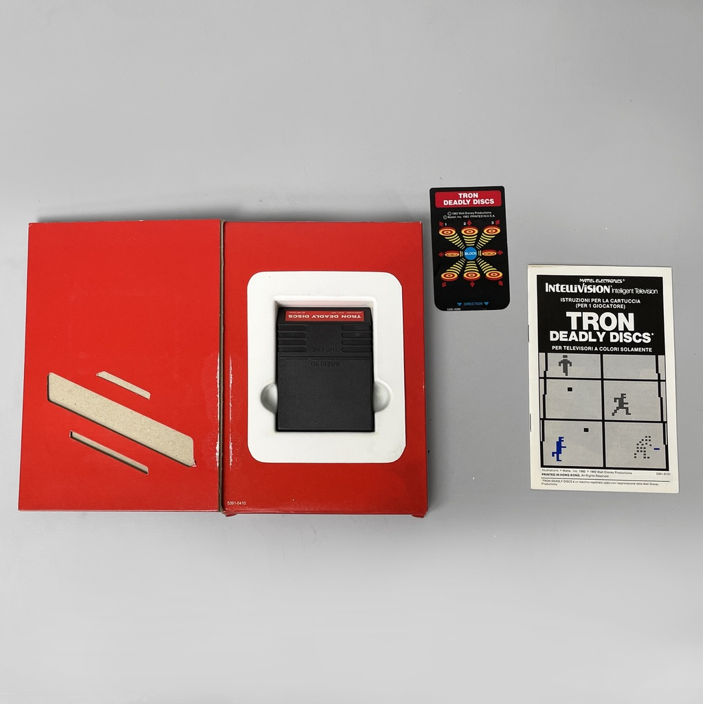 Consolle Intellivision e videogioco di Tron deadly discs di Mattel, 1980 ca.