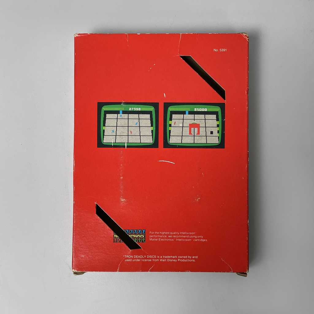 Consolle Intellivision e videogioco di Tron deadly discs di Mattel, 1980 ca.