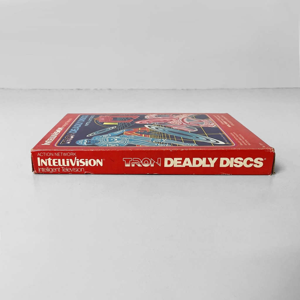 Consolle Intellivision e videogioco di Tron deadly discs di Mattel, 1980 ca.
