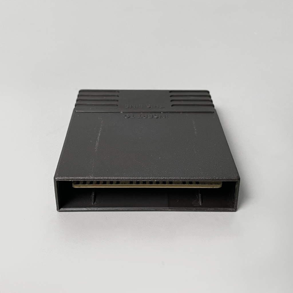 Consolle Intellivision e videogioco di Tron deadly discs di Mattel, 1980 ca.