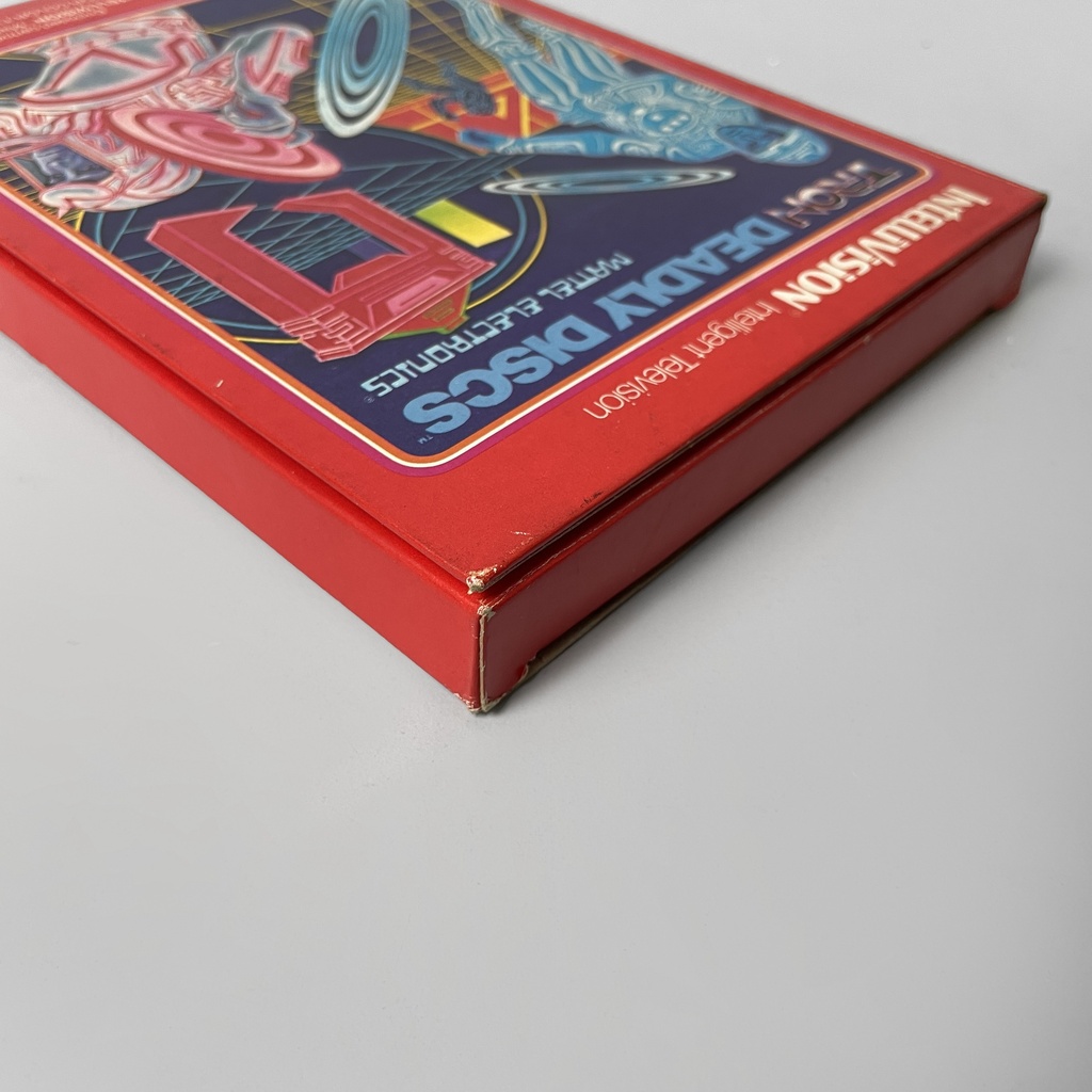 Consolle Intellivision e videogioco di Tron deadly discs di Mattel, 1980 ca.