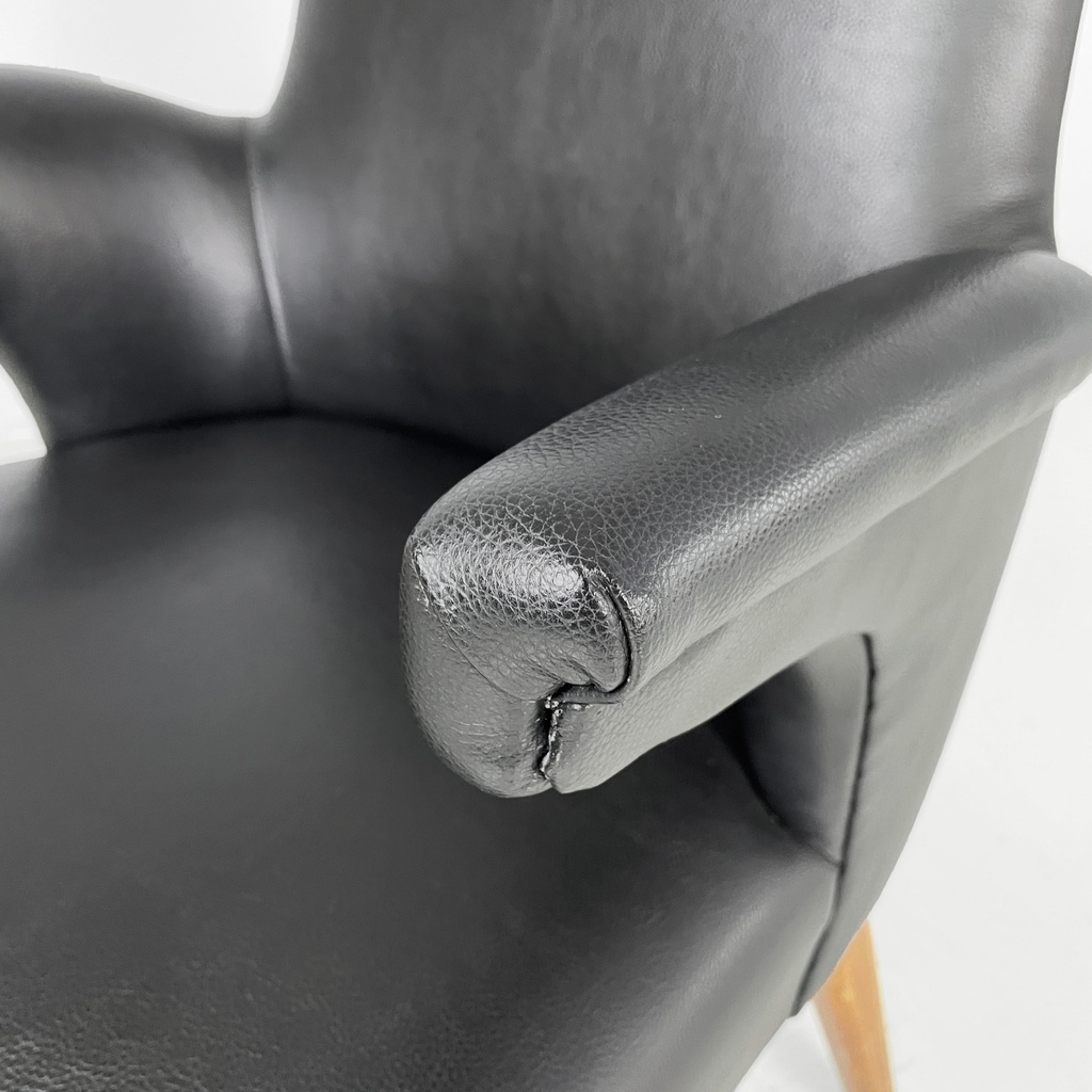Poltrone in pelle nera e legno, 1960 ca.