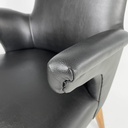Poltrone in pelle nera e legno, 1960 ca.