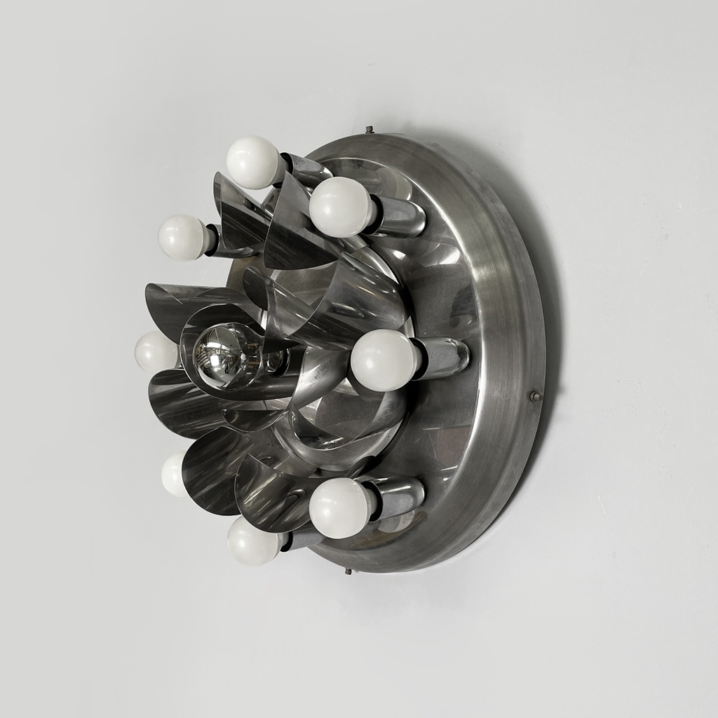 Applique in acciaio, 1970 ca.